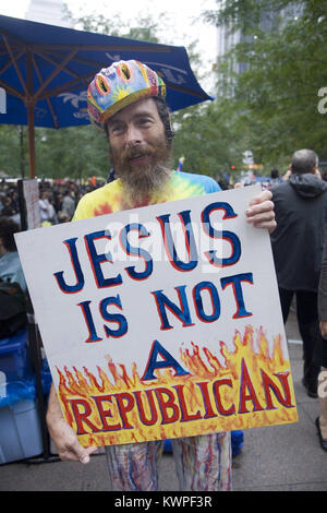 Occupy Wall Street activists hold their ground in the early morning of Oct. 14, 2011 when New York CIty Mayor threatened to remove them. Stock Photo