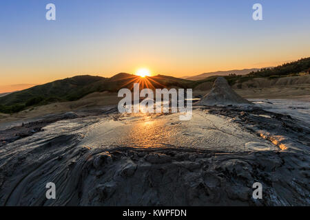 sunset in Mud Volcanoes. Buzau county, Romania Stock Photo