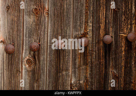 Rusty wooden door to use for wallpaper Stock Photo