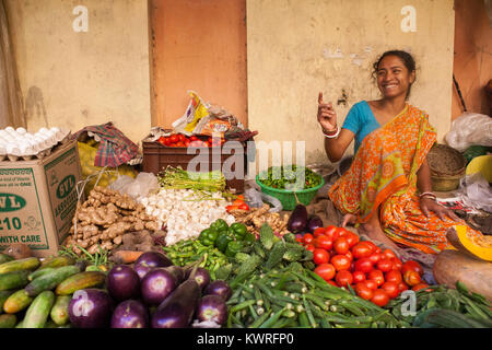 Vegetable seller at the market in the Garia district of Kolkata, India Stock Photo
