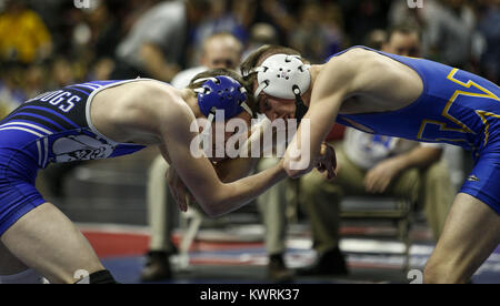 Des Moines, Iowa, USA. 16th Feb, 2017. Wilton's Cory Anderson grapples with Odgen's Austin Flynn during session two of the 2017 IHSAA State Wrestling Championships at Wells Fargo Arena in Des Moines on Thursday, February 16, 2017. Credit: Andy Abeyta/Quad-City Times/ZUMA Wire/Alamy Live News Stock Photo