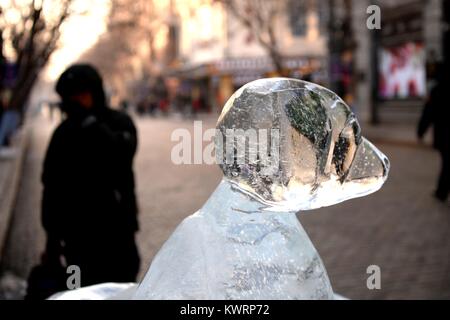 Harbin, China's Heilongjiang Province. 5th Jan, 2018. A citizen views an ice sculpture in Harbin, capital of northeast China's Heilongjiang Province, Jan. 5, 2018. Credit: Wang Kai/Xinhua/Alamy Live News Stock Photo