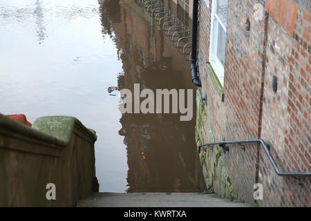 York, UK. 5th Jan, 2018. River Ouse oozes over the riverbank in York causing flooding after storm Eleanor Credit: Keith Larby/Alamy Live News Stock Photo