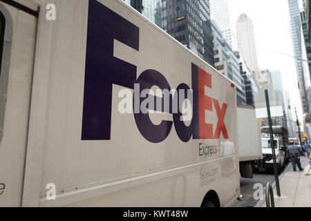 Federal Express (FedEx) truck with logo parked on Madison Avenue in Manhattan, New York City, New York, September 14, 2017. Stock Photo