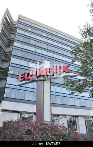 Sign with logo and a portion of the main building are visible at the headquarters of credit bureau Equifax in downtown Atlanta, Georgia, September 20, 2017. In September of 2017, a data breach at Equifax exposed the personal information of thousands of customers. Stock Photo