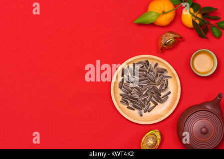 Conceptual flat lay Chinese New Year food and drink still life. Stock Photo