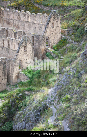 Steep old trail leading to ruins of Pinkuylluna (an ancient Incan granary) outside of the town of Ollantaytambo, Peru. Stock Photo