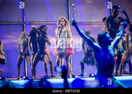 The winner of Eurovision Song Contest 2013, Emmelie de Forest, performs a medley of last year’s winner song ‘Only Teardrops’ and this year’s theme song ‘Rainmaker’ at the final show of the Eurovision Song Contest 2014 in Copenhagen. Denmark 10/05 2014. Stock Photo