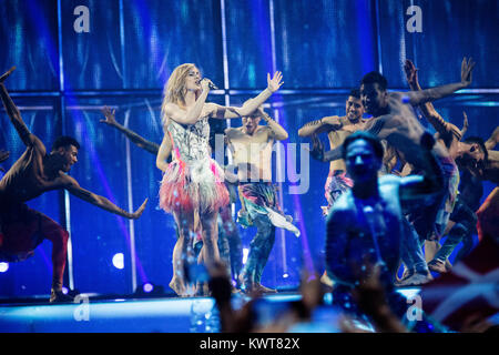 The winner of Eurovision Song Contest 2013, Emmelie de Forest, performs a medley of last year’s winner song ‘Only Teardrops’ and this year’s theme song ‘Rainmaker’ at the final show of the Eurovision Song Contest 2014 in Copenhagen. Denmark 10/05 2014. Stock Photo