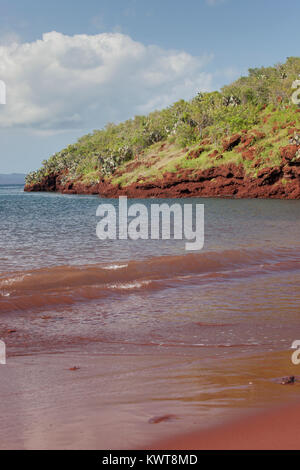 An empty red sand beach on the island of Rabida, Galapagos. Stock Photo