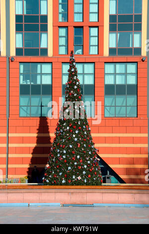 Christmas tree outside Hotel New York at Disneyland Paris. EuroDisney. Stylised exterior of hotel Stock Photo