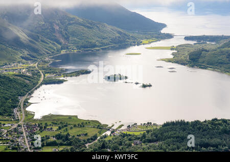 Mountains rise from the shores of Loch Leven sea loch in the West Highlands of Scotland, as seen from the summit of Pap of Glencoe. Stock Photo