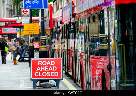 London, England, UK. Buses queuing in Whitehall due to road closed ahead Stock Photo