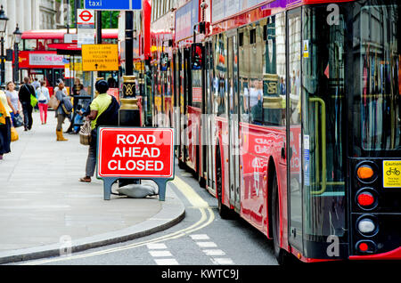 London, England, UK. Buses queuing in Whitehall due to road closed ahead Stock Photo