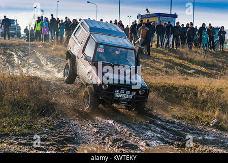 Lviv,Ukraine- December 6, 2015:Unknown rider on the off-road vehicle overcomes a route off road near the city of Lviv, Ukraine Stock Photo