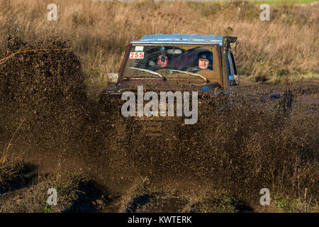 Lviv,Ukraine- December 6, 2015:Unknown rider on the off-road vehicle overcomes a route off road near the city of Lviv, Ukraine Stock Photo