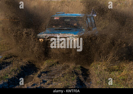 Lviv,Ukraine- December 6, 2015: Unknown rider on the off-road vehicle overcomes a route off road near the city of Lviv, Ukraine Stock Photo