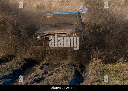 Lviv,Ukraine- December 6, 2015: Unknown rider on the off-road vehicle overcomes a route off road near the city of Lviv, Ukraine Stock Photo