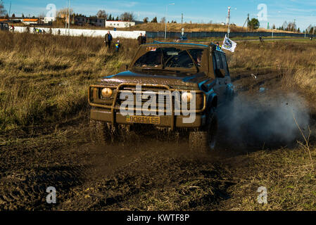 Lviv,Ukraine- December 6, 2015: Unknown rider on the off-road vehicle overcomes a route off road near the city of Lviv, Ukraine Stock Photo