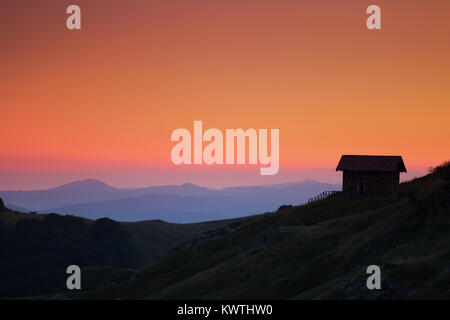 Alpine Landscape with refuge cabin and sunset light in Beigua National Geopark, Liguria, Italy Stock Photo