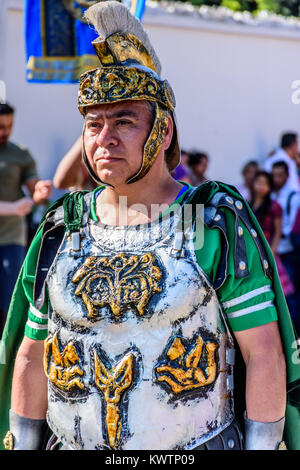 Antigua, Guatemala -  March 19, 2017: Roman soldier in Lent procession in town with most famous Holy Week celebrations in Latin America Stock Photo