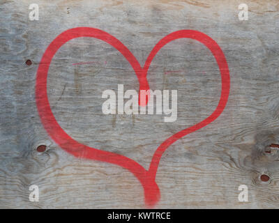 painted heart on wooden surface Stock Photo
