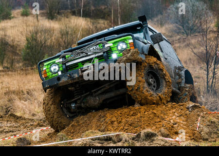 Lviv, Ukraine - February 21, 2016: Off-road vehicle brand Nissan  overcomes the track on a amateur competitions Trial near the city Lviv, Ukraine Stock Photo