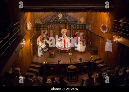 FORT COCHIN, India -  January 10, 2015: Kathakali performer in the virtuous pachcha role in Cochin on January 10, 2015 in South India. Kathakali is the ancient classical dance form of Kerala. Stock Photo