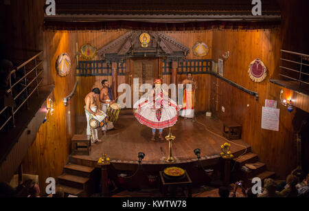 FORT COCHIN, India -  January 10, 2015: Kathakali performer in the virtuous pachcha role in Cochin on January 10, 2015 in South India. Kathakali is the ancient classical dance form of Kerala. Stock Photo