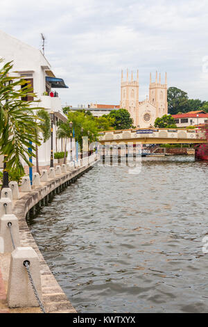 Malacca river and the Church of St Francis Xavier, Melaka, Malaysia Stock Photo