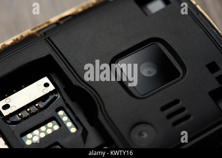 Close up of camera and sim slot in modern mobile phone Stock Photo