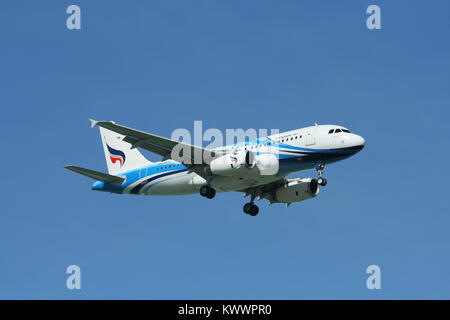 CHIANGMAI , THAILAND - JULY 10 2009: HS-PGS Airbus A319-100 of Bangkokairway. Landing to Chiangmai airport from Bangkok Suvarnabhumi. Stock Photo