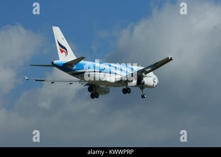 CHIANGMAI , THAILAND - JULY 10 2009: HS-PGS Airbus A319-100 of Bangkokairway. Landing to Chiangmai airport from Bangkok Suvarnabhumi. Stock Photo