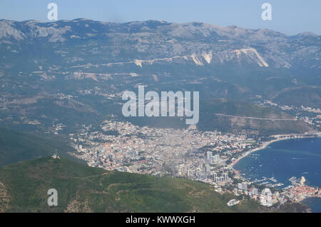 Aerial view from a plane to a coastline with a coastal town in Montenegro Stock Photo