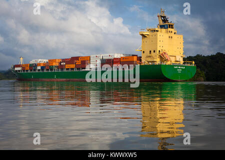 Container ship passing through the Panama Canal, Gatun lake, Republic of Panama. Stock Photo