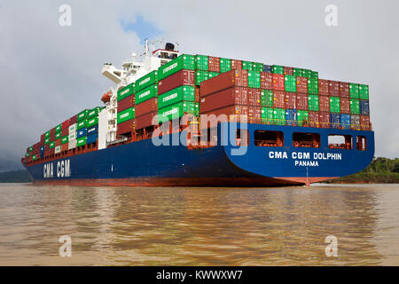 Container ship passing through the Panama canal, Lago Gatun, Republic of Panama. Stock Photo