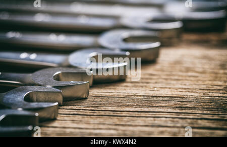 Set of wrenches on a wooden surface Stock Photo