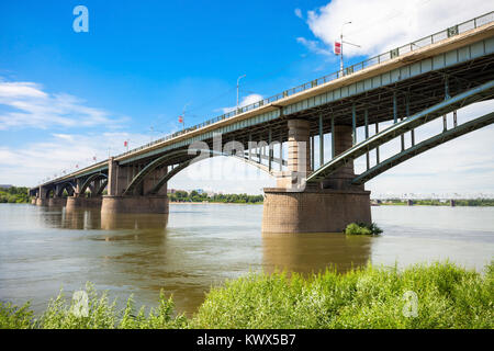 Communal road bridge across Ob river in Novosibirsk, Russia Stock Photo
