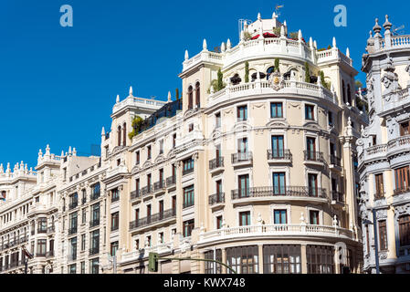 Historical buildings at the Gran Via in Madrid, Spain Stock Photo