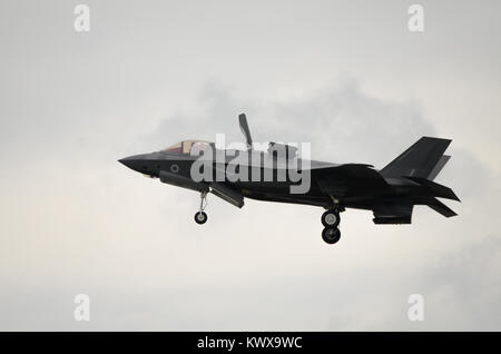 An RAF F35 Lightning hovers. The intake door is open and the rear engine nozzle is rotated downwards. Stock Photo