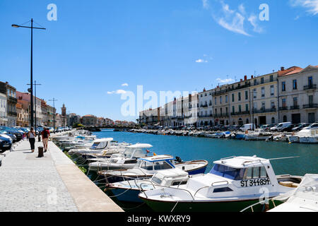 Boats moored along the canal in Sete, Herault, Occitanie, France. A major port on the Mediterranean coast. Stock Photo