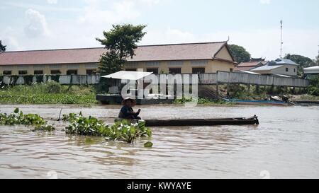 Lady Fishing in Boat Takeo Cambodia Mekong Delta Rural Secluded Flood Plain Fishing Area Fantastic Scenery of a Flat, Low-lying Area Stock Photo