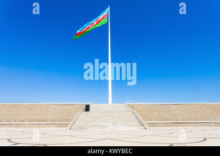 National Flag Square is a large city square off Neftchiler Avenue in Baku, Azerbaijan. A flag measuring 70 by 35 metres flies on a pole 162 m high. Stock Photo