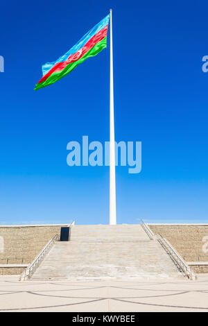 National Flag Square is a large city square off Neftchiler Avenue in Baku, Azerbaijan. A flag measuring 70 by 35 metres flies on a pole 162 m high. Stock Photo