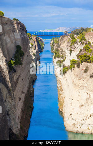 The Corinth Canal is a canal that connects the Gulf of Corinth with the Saronic Gulf in the Aegean Sea. It cuts Isthmus of Corinth and separates Pelop Stock Photo