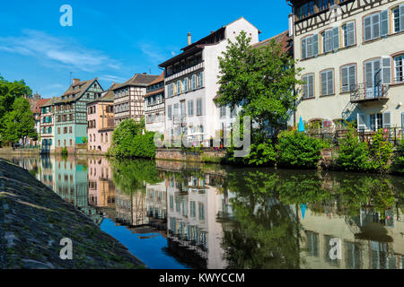 Timbered Houses reflecting in the ILL canal along the Quai de la Petite France, Strasbourg, Alsace, Bas-Rhin Department, France Stock Photo