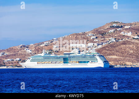 Cruise ship near the Mykonos island, Cyclades in Greece. Stock Photo