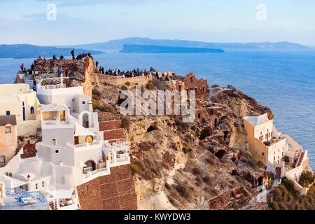 Byzantine Castle Ruins in Oia Santorini island in the Cyclades, Greece on sunset Stock Photo