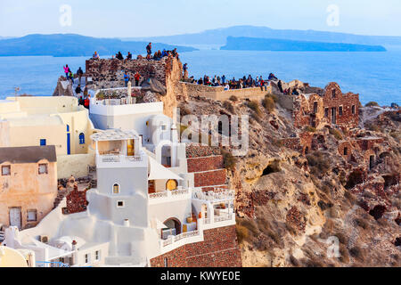 Byzantine Castle Ruins in Oia Santorini island in the Cyclades, Greece on sunset Stock Photo