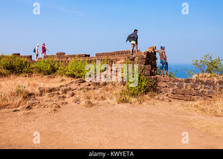 Tourists at the Chapora Fort. Fort is located in north Goa, rises high above the Chapora River, India. Stock Photo